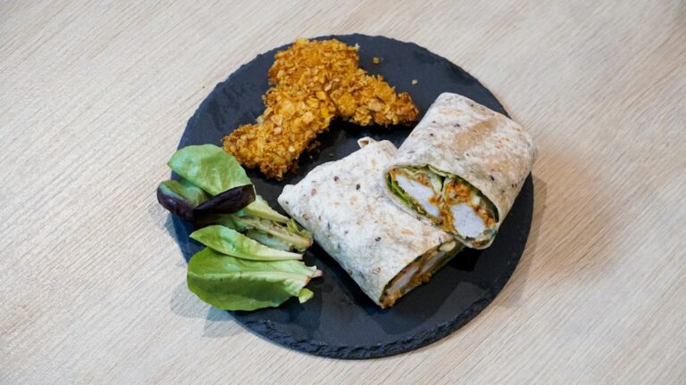 A chicken wrap filled with vegetables.