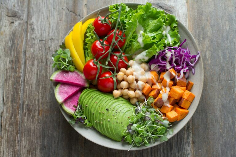A colourful bowl of mixed salad vegetables.