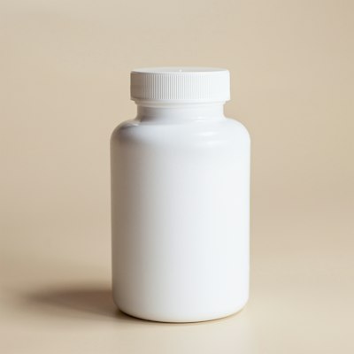 A plain white supplement bottle on a beige background.